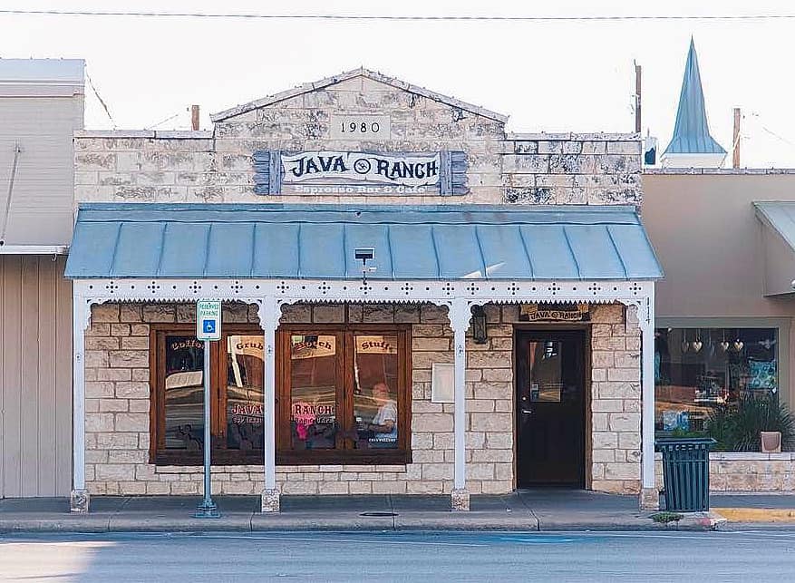 Java Ranch Espresso Bar stone facade with metal roof, rustic exterior, visible signage.
