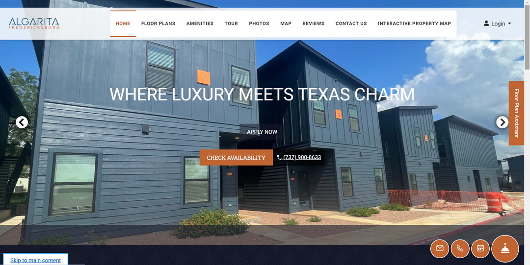 Algarita Fredericksburg modern blue siding apartments with large windows, unit numbers in orange, stylish exterior.