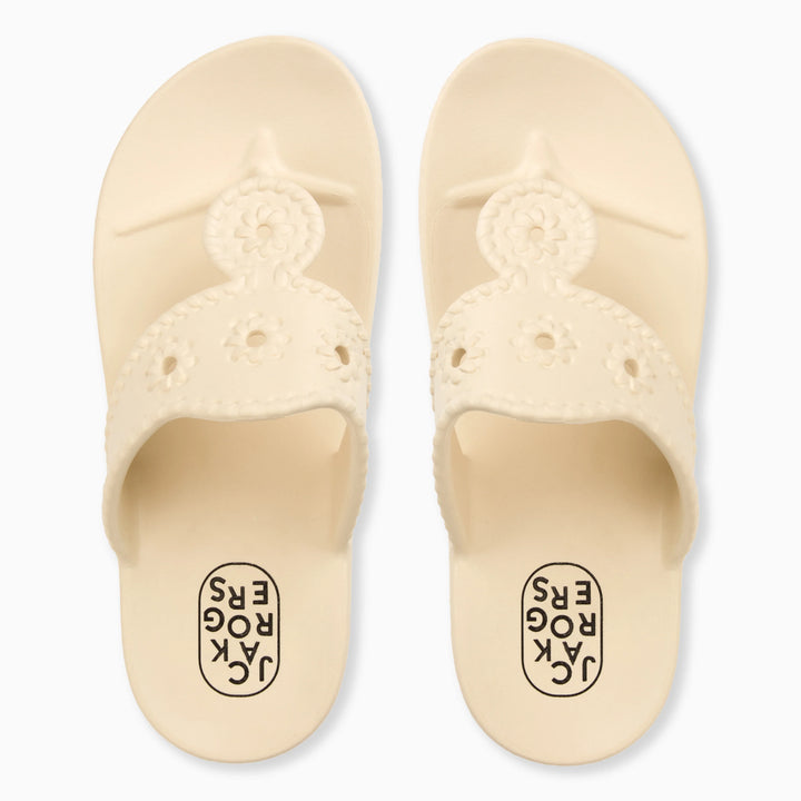 A pair of CREAM JACKS EVA sandals by Zertz, featuring ergonomic design, floral cutout straps, and the brand name on the footbed.