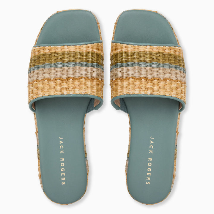 A pair of Zertz BAY FLATFORM-RAFFIA shoes features woven, multicolored straps and teal footbeds, shown from above on a white background—perfect flatforms for your next beach vacation.