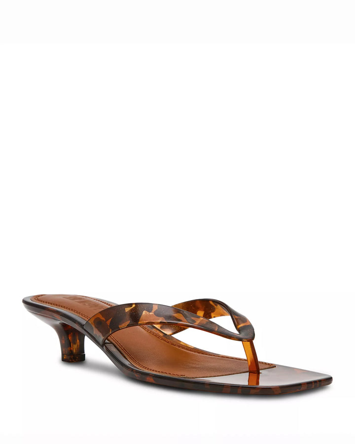 The TRACIE SANDAL by Zertz showcases a brown tortoiseshell pattern, open toe, thong strap, and low kitten heel for stylish comfort—all set against a crisp white backdrop.
