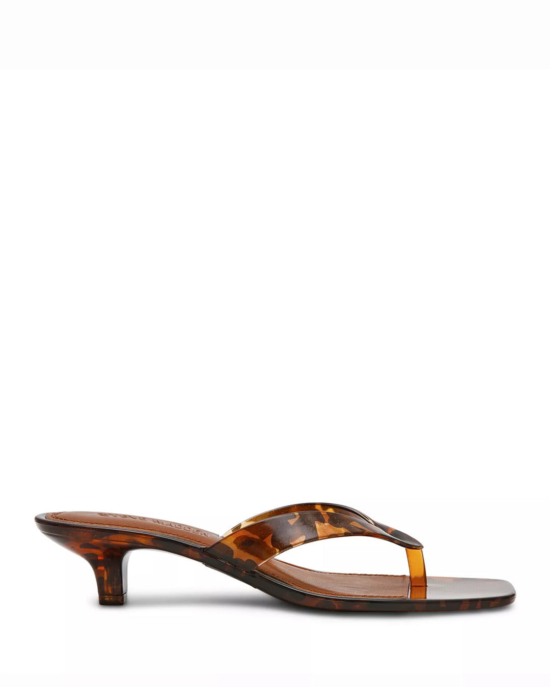 The TRACIE SANDAL by Zertz features a brown tortoiseshell pattern, low thin heel, and thong strap design. Shown in side profile on a white background, it&