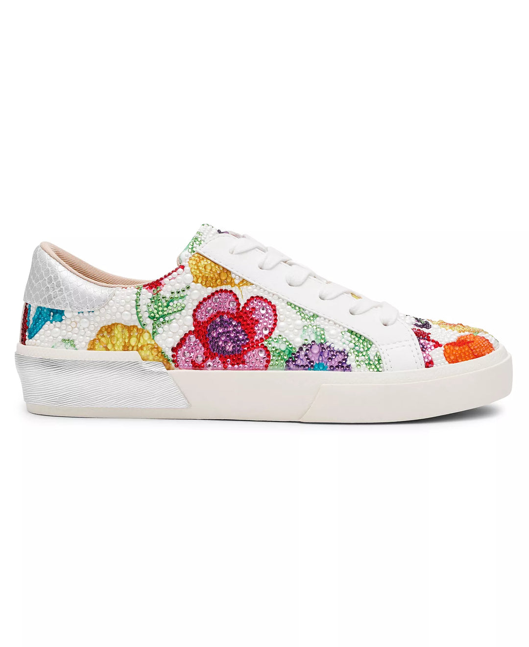 The Zertz DAMON SNEAKER SB-DAMNON features a white lace-up design with a textured surface and vibrant red, yellow, purple, and green floral embroidery on the side and toe, set against a plain white background.