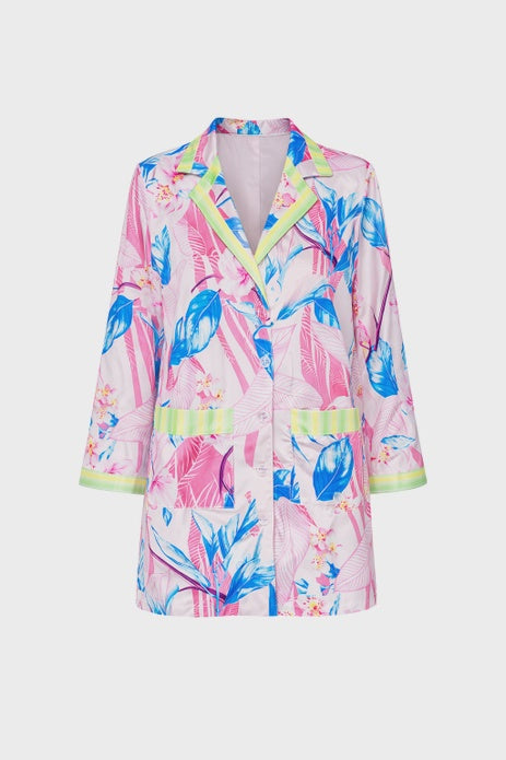 The Zertz FLORAL PRINTED SHIRT DRESS is a long-sleeve, button-up dress with a vibrant tropical leaf print in pink and blue, yellow-green trim on the collar and cuffs, plus decorative front pockets.