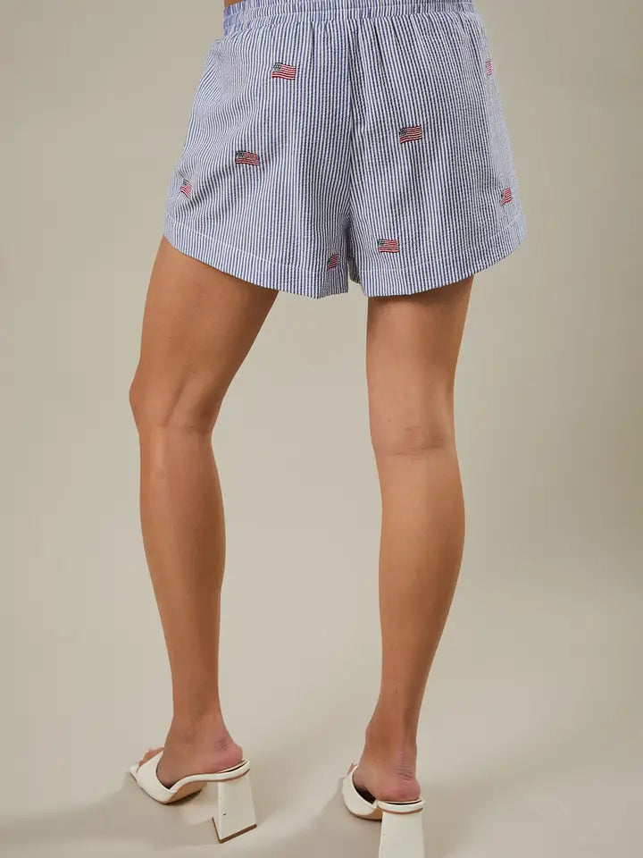 A person stands with their back to the camera wearing Zertz&
