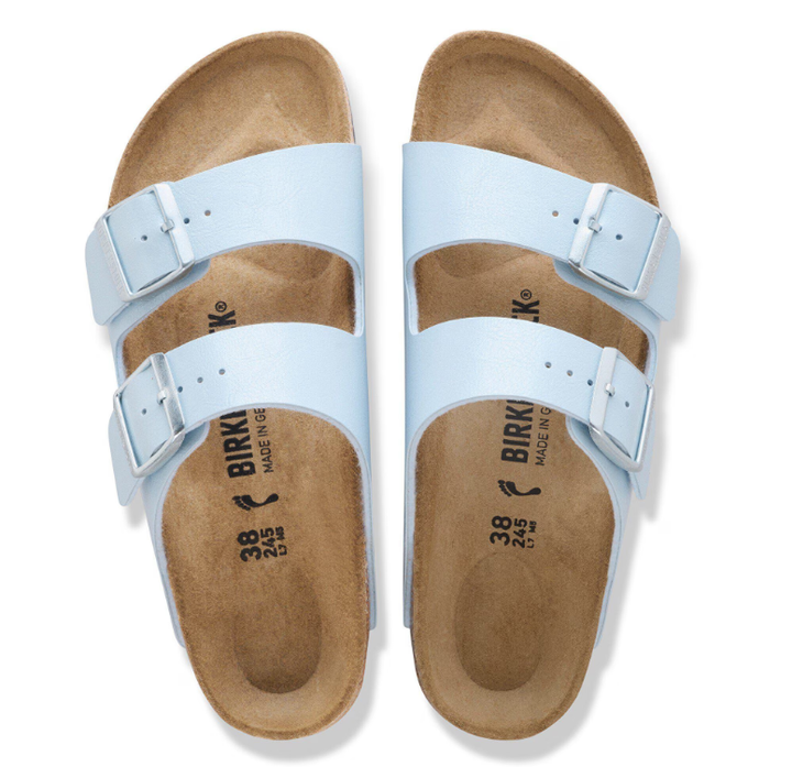 The Zertz ARIZONA BF GRACEFUL BABY BLUE N 1031608 sandals feature two light blue straps with silver buckles and tan cork footbeds, displayed from above.