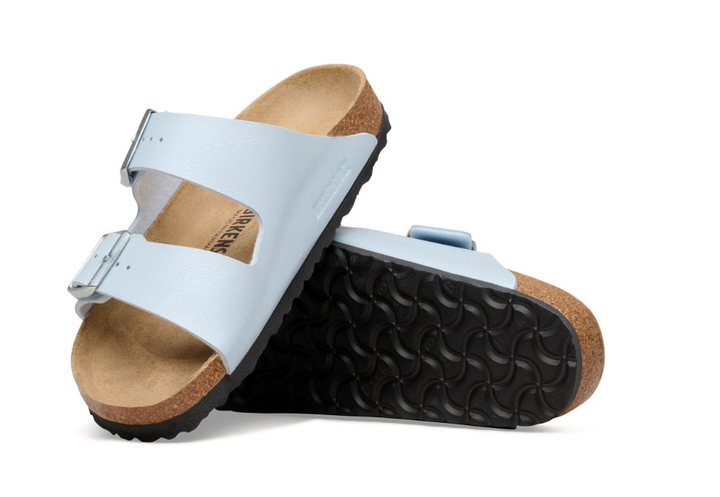 The Zertz ARIZONA BF GRACEFUL BABY BLUE N 1031608 sandals feature light blue uppers, cork soles, and black textured rubber outsoles—one upright showing the sole, the other flat displaying the top and footbed.