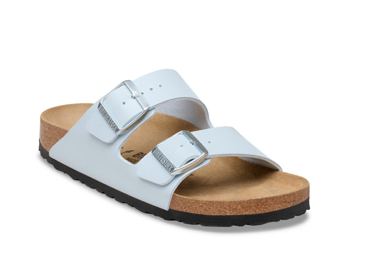 The Zertz ARIZONA BF GRACEFUL BABY BLUE N 1031608 is a two-strap sandal in baby blue with silver buckles, a cork footbed, and a black rubber sole, shown on a white background.