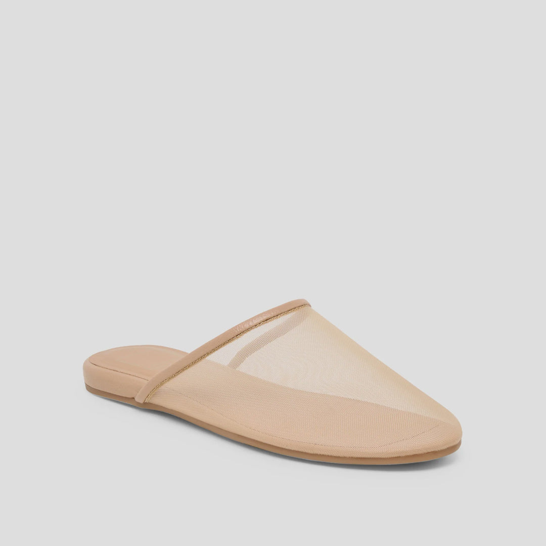The GENI by Zertz is a beige mesh slip-on sandal with a sheer upper, rounded toe, and flat sole that combines ballet flat elegance with comfort—shown on a plain light gray background.