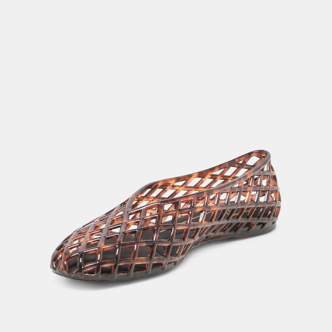 The JAM FLATS by Zertz are brown, closed-toe flats featuring a glossy, translucent lattice design and a low heel. This stylish footwear is displayed against a plain white background.
