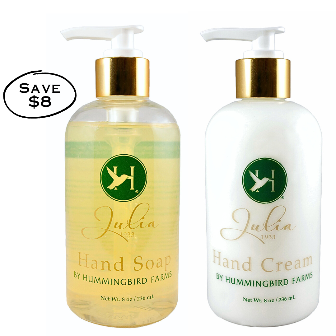 Save $8 on the Julia 1933 Hand Soap & Cream Duo by Hummingbird Farms, featuring a clear pump bottle of hand soap and a white pump bottle of hand cream.
