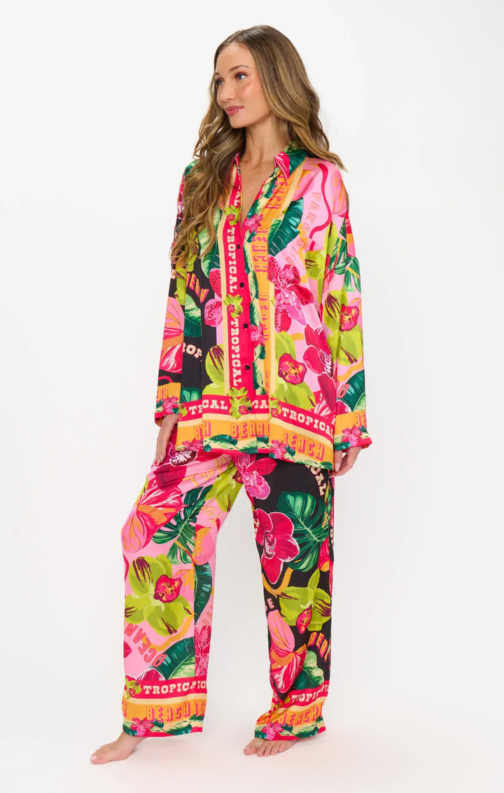 A woman stands barefoot, smiling softly in Zertz&