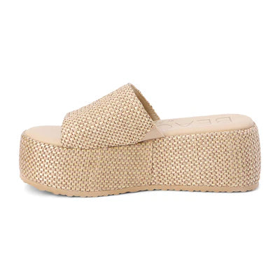 The PISMO PLATFORM SANDAL by Zertz is a beige vegan flatform sandal with a woven texture and a wide strap across the top.