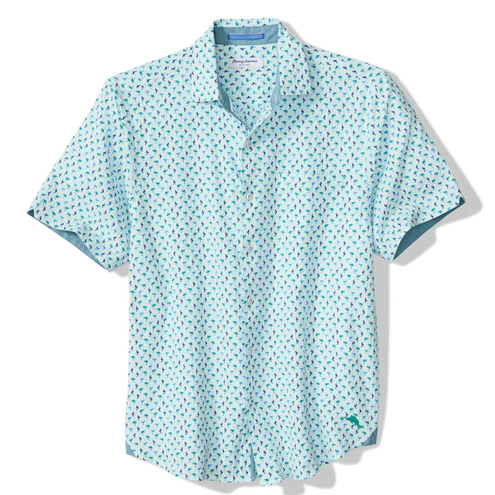 The Zertz NOVA WAVE FLOCK IT TO YOU is a light blue, short-sleeve button-up cotton shirt with a white background and a subtle green and blue palm tree print, perfect for an island-inspired look.