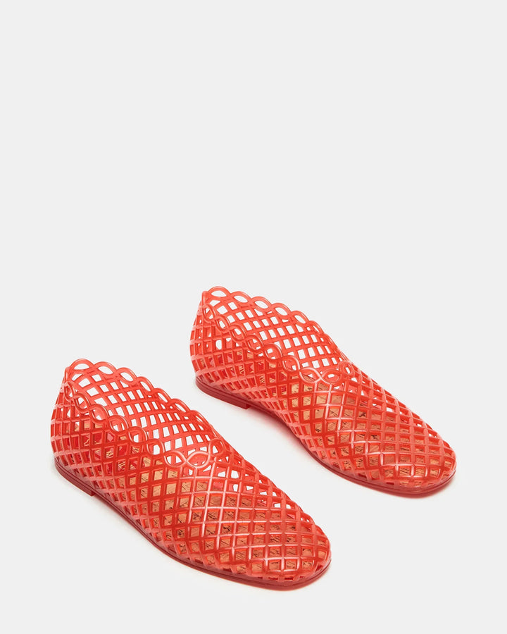 The Zertz GROVE JELLY SLIP ON is a bright red, lattice-patterned, ankle-height shoe with a closed toe and classic jelly cage design, shown on a plain white background.