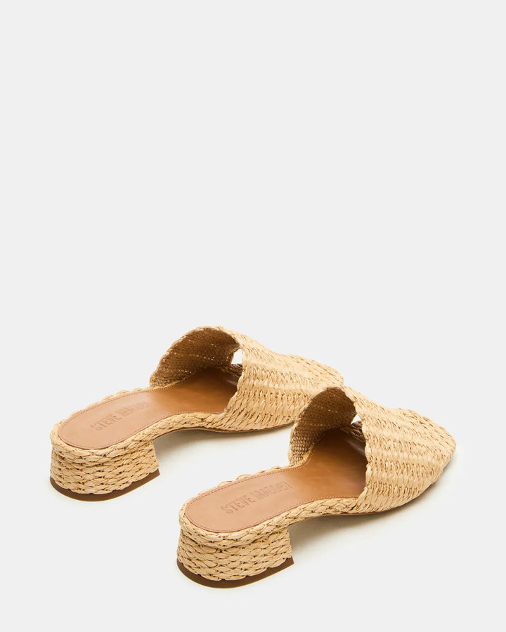 The Zertz MONTGOMERY SLIDE SANDAL features woven raffia, low block heels, and open toes, showcased against a light background.