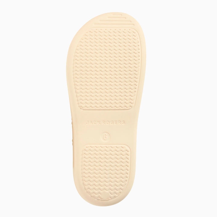 The Zertz JACKS EVA sandal features a beige EVA sole with a textured grip and ergonomic design; "Zertz" and size 6 are embossed near the arch, shown against a plain white background.