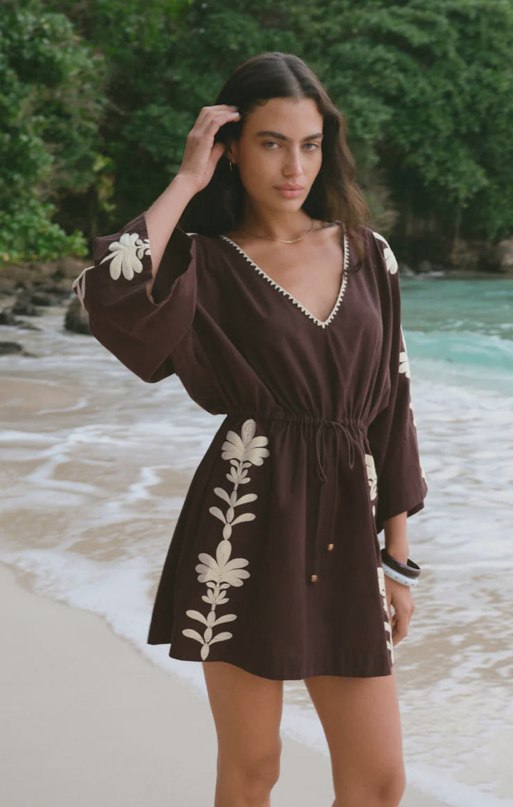WHISPERING PALMS COVER UP