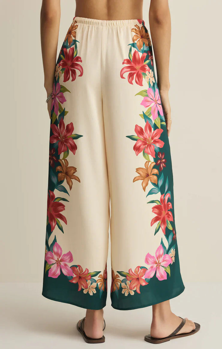 A person is barefoot and vacation-ready in Zertz&