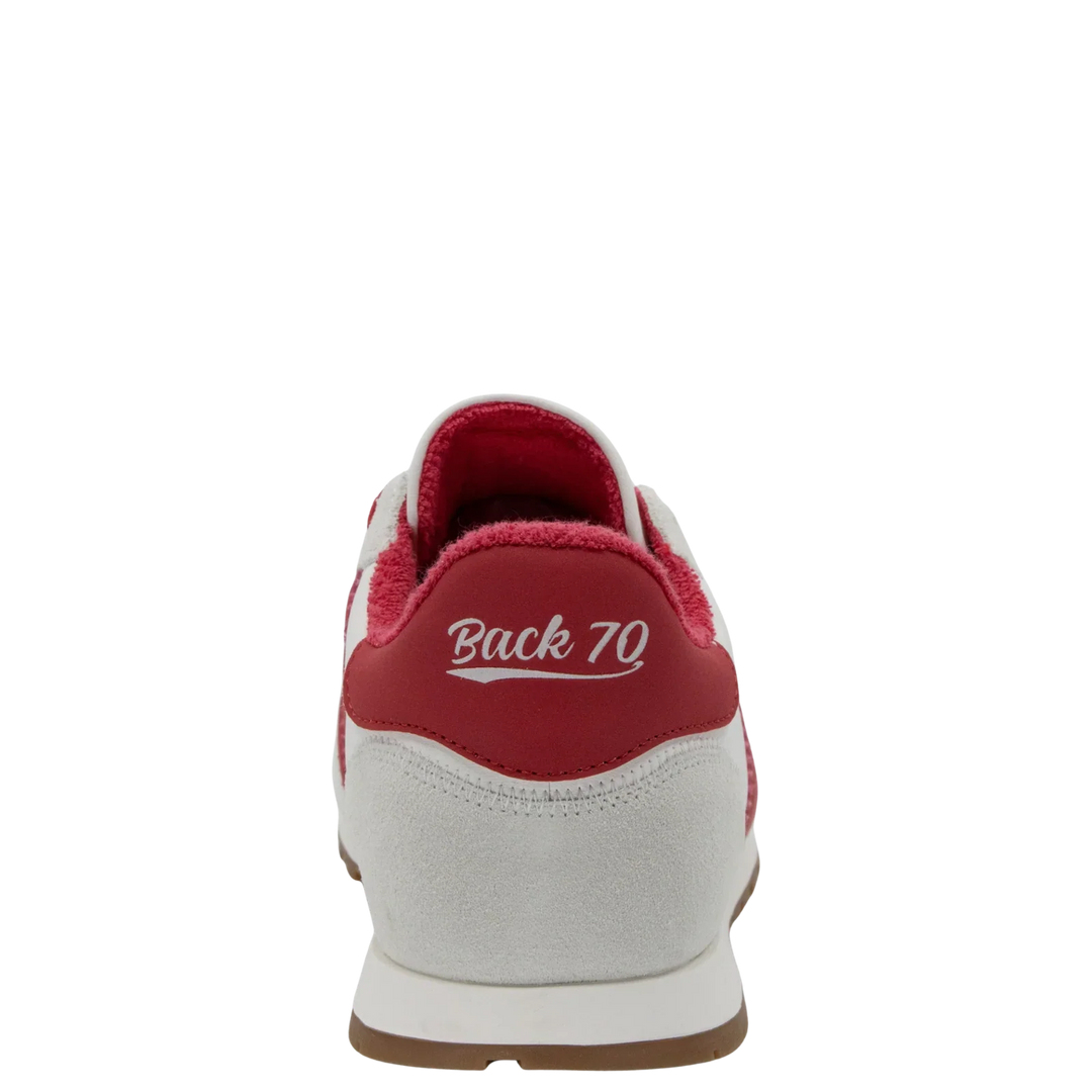 The Zertz ASIAN RED SNEAKER is a street-style shoe with a white upper, red accents, and brown rubber sole. Viewed from the back, “Back 70” in white appears on the heel tab for a fashionable touch.