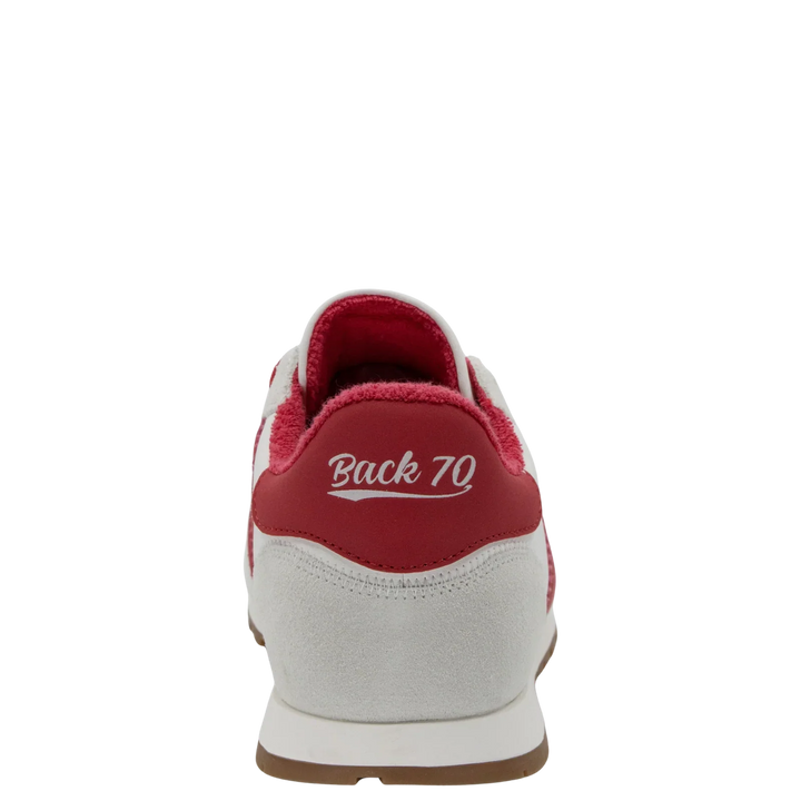 The Zertz ASIAN RED SNEAKER is a street-style shoe with a white upper, red accents, and brown rubber sole. Viewed from the back, “Back 70” in white appears on the heel tab for a fashionable touch.