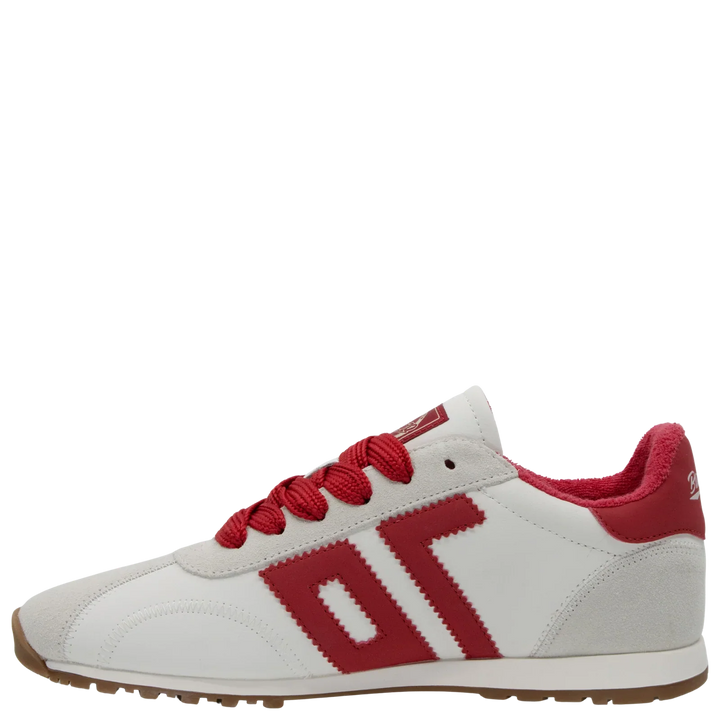 The ASIAN RED SNEAKER by Zertz is a white and red fashion sneaker with red laces, a red side logo, and a tan rubber sole, shown on a white background.