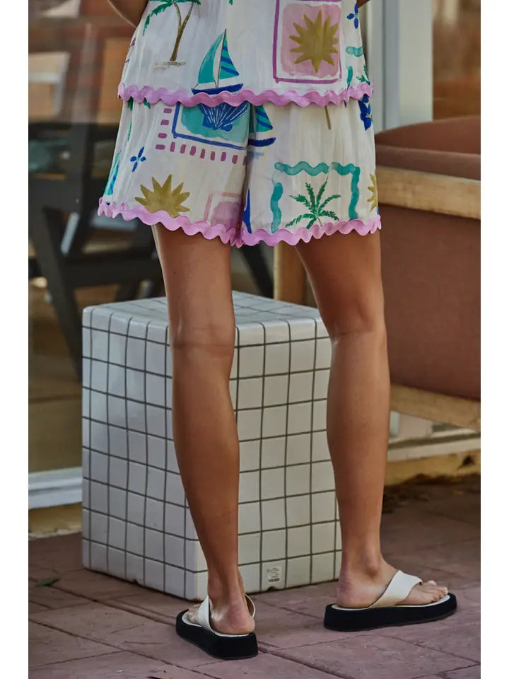 A person stands outdoors on a patio wearing Zertz&
