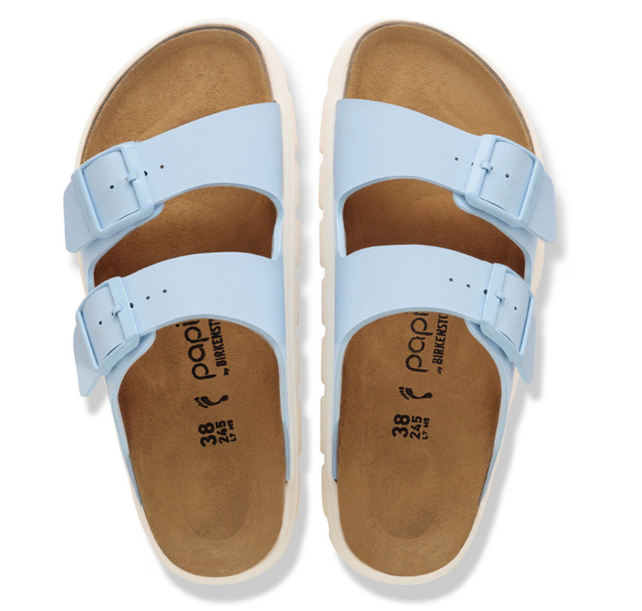 A pair of Zertz ARIZONA CHUNKY BF BABY BLUE N 1031206 sandals with double buckles, contoured footbeds, chunky white soles, and size and brand marked on the insole, shown from above.