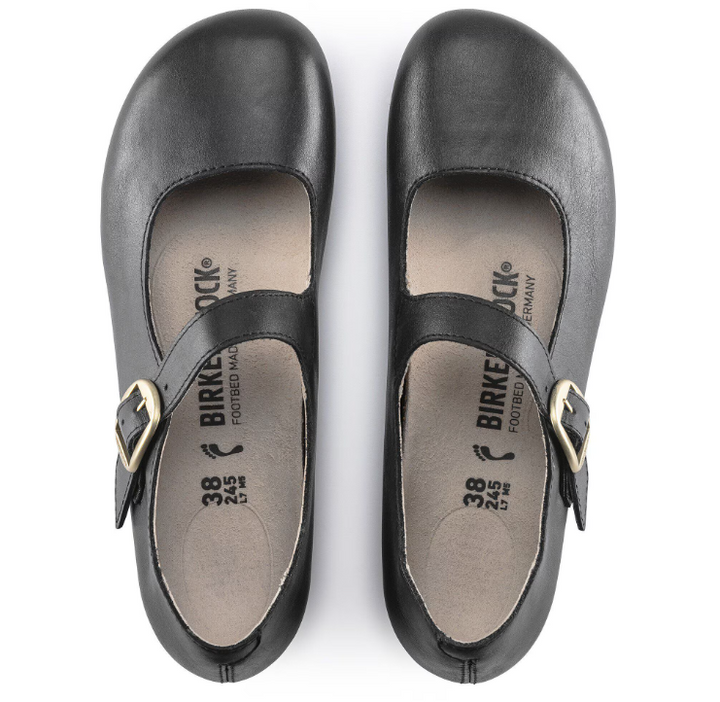 A pair of TRACY LEATHER BLACK 4 Mary Jane shoes by Zertz, with rounded toes and gold buckles, is viewed from above. The contoured footbed enhances the feminine look, while insoles show the Zertz logo and size details.