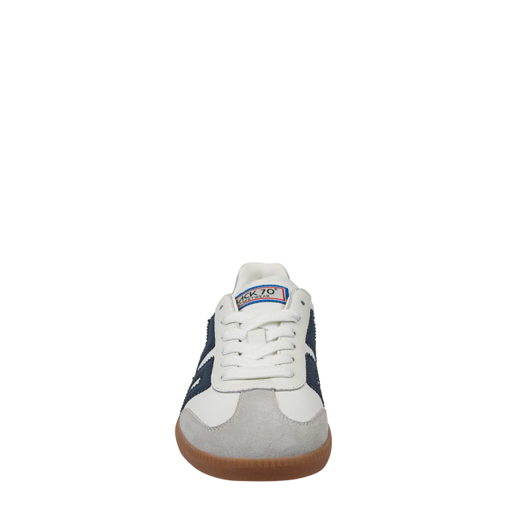 The Zertz CLOUD IN NAVY SNEAKER features a white and grey color block design with navy accents, white laces, and a brown gum sole, displayed from the front on a plain white background.