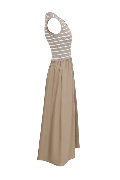 The Zertz LUCIENNE KNIT MIDI DRESS features a sleeveless, fitted ribbed beige and white top with a solid light brown woven skirt. Shown in side profile on a white background.