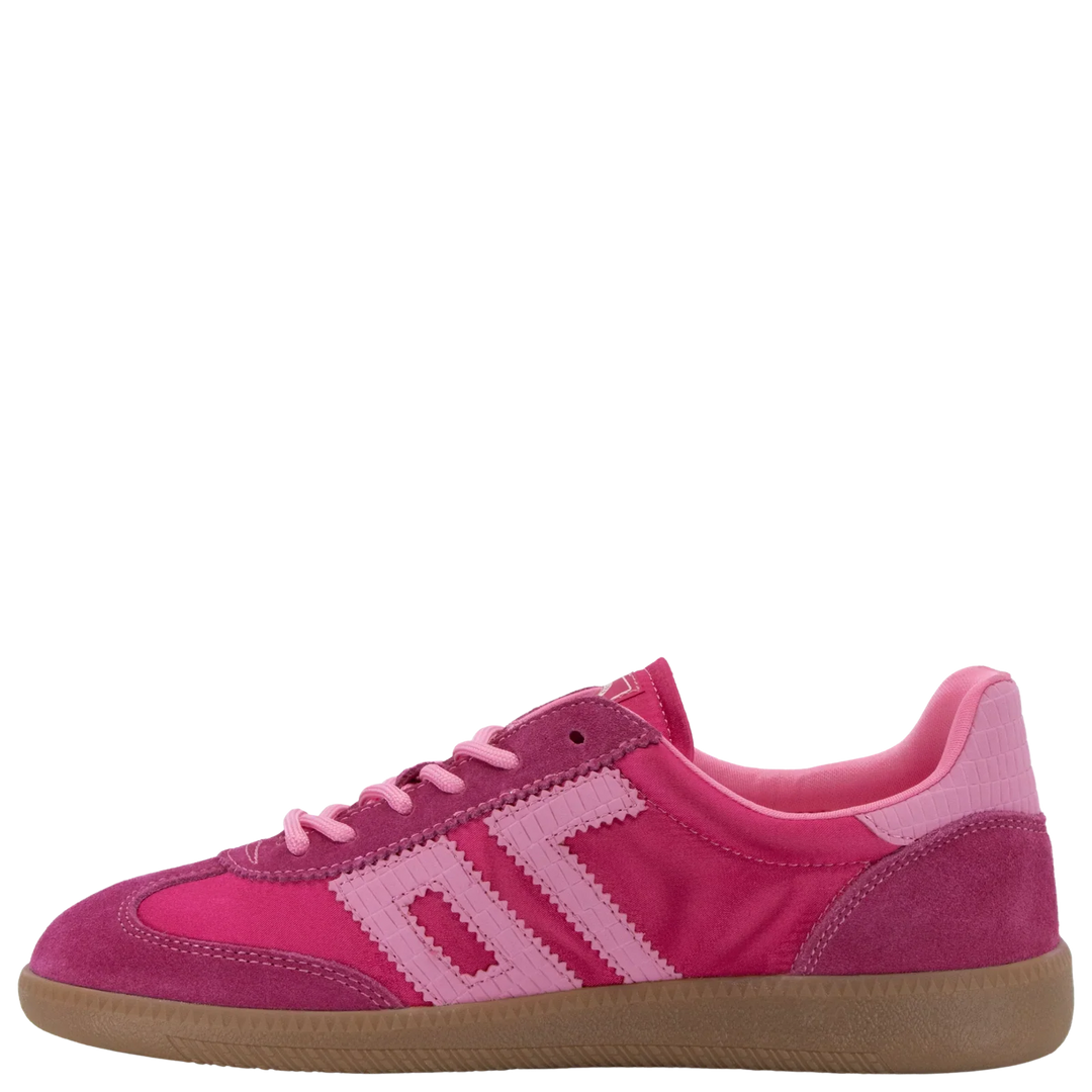 A side view of the Zertz GHOST C26 IN FUXIA SNEAKER features pink suede and fabric with light pink laces, white stripe accents, and a light brown rubber sole, all set against a white background.