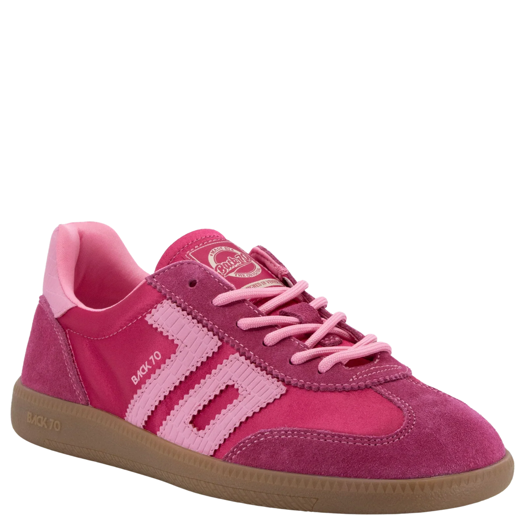 The Zertz GHOST C26 IN FUXIA SNEAKER features pink suede, light pink stripes, pink laces, a tan rubber sole, and BAK.70 text on the side—ideal for adding sporty style to any casual look.
