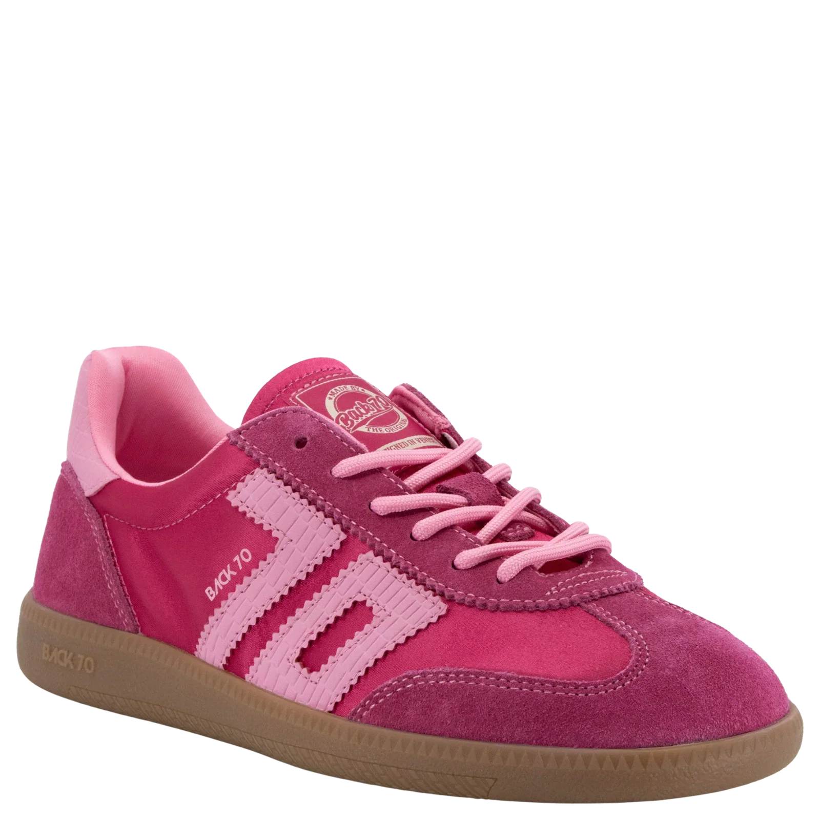 The Zertz GHOST C26 IN FUXIA SNEAKER features pink suede, light pink stripes, pink laces, a tan rubber sole, and BAK.70 text on the side—ideal for adding sporty style to any casual look.