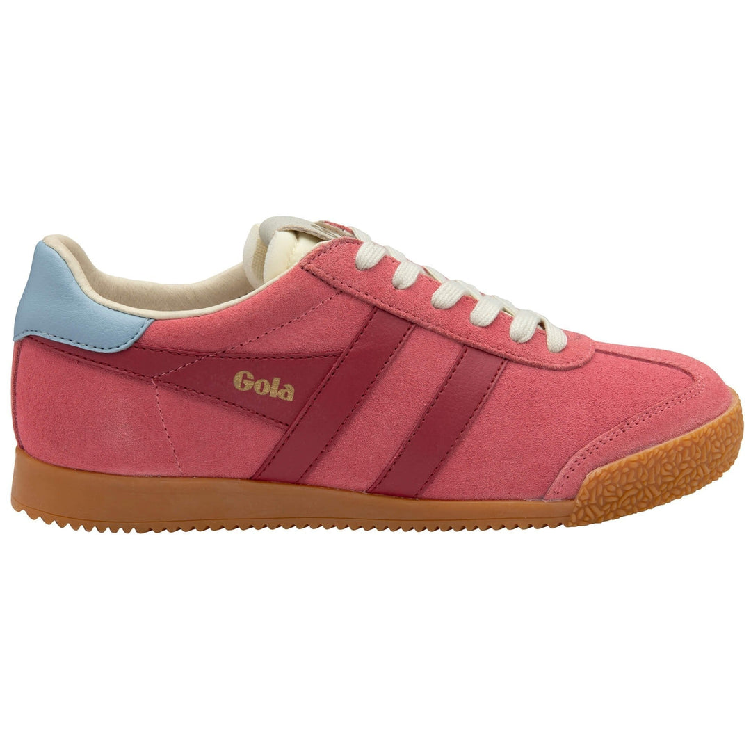 The Zertz ELAN TRAINER is a women’s pink suede sneaker featuring a gum sole, maroon side stripes, white laces, light blue heel patch, and gold Zertz branding—a vintage-inspired style with standout appeal.