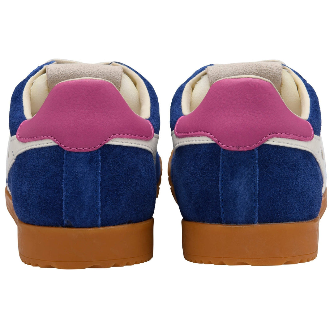 The Zertz ELAN TRAINER CLB538ET sneakers are shown from the back, showcasing blue suede, white accents, pink heel tabs, and brown rubber soles.