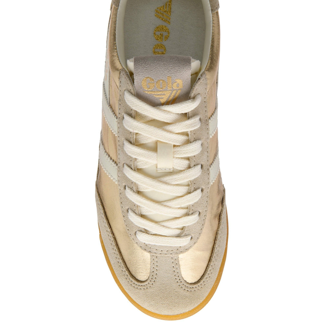 Top view of the Zertz FIREFLY NETALLIC TRAINER CLB858YW20 in beige and cream with white stripes, white laces, a gum sole, and gold branding on the insole.
