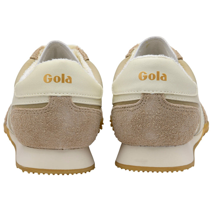 Rear view of a pair of bone suede SPRINTER TAINER sneakers by Zertz, featuring beige and cream suede and leather accents with the brand name Zertz in gold lettering on the heel.