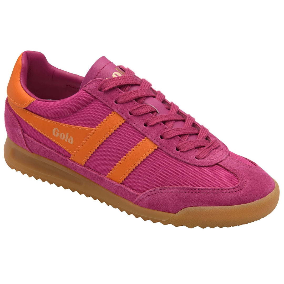 The TORNADO TRAINER CL623KU20 by Zertz is a pink sneaker with orange stripes and details, brown gum sole, suede and mesh texture, matching pink laces, and the Zertz logo on the side.