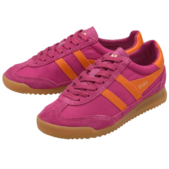 A pair of pink TORNADO TRAINER CL623KU20 sneakers by Zertz with orange stripes, accents, gum soles, and the brand name on the side. Both the side and front views of the shoes are shown.
