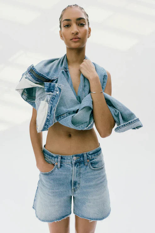 A woman stands confidently in Zertz&