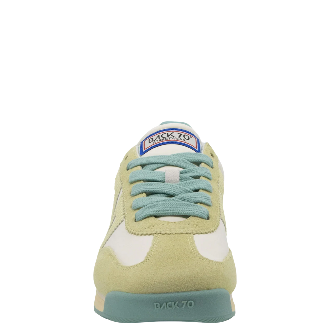 Front view of Zertz JOGGER N26 in SNEAKERS: pastel leather with light green suede, white panels, teal laces, blue and red BACK 70 tongue logo, plus pale teal toe cap and sole embossed with BACK 70 for a quiet luxury sportswear touch.