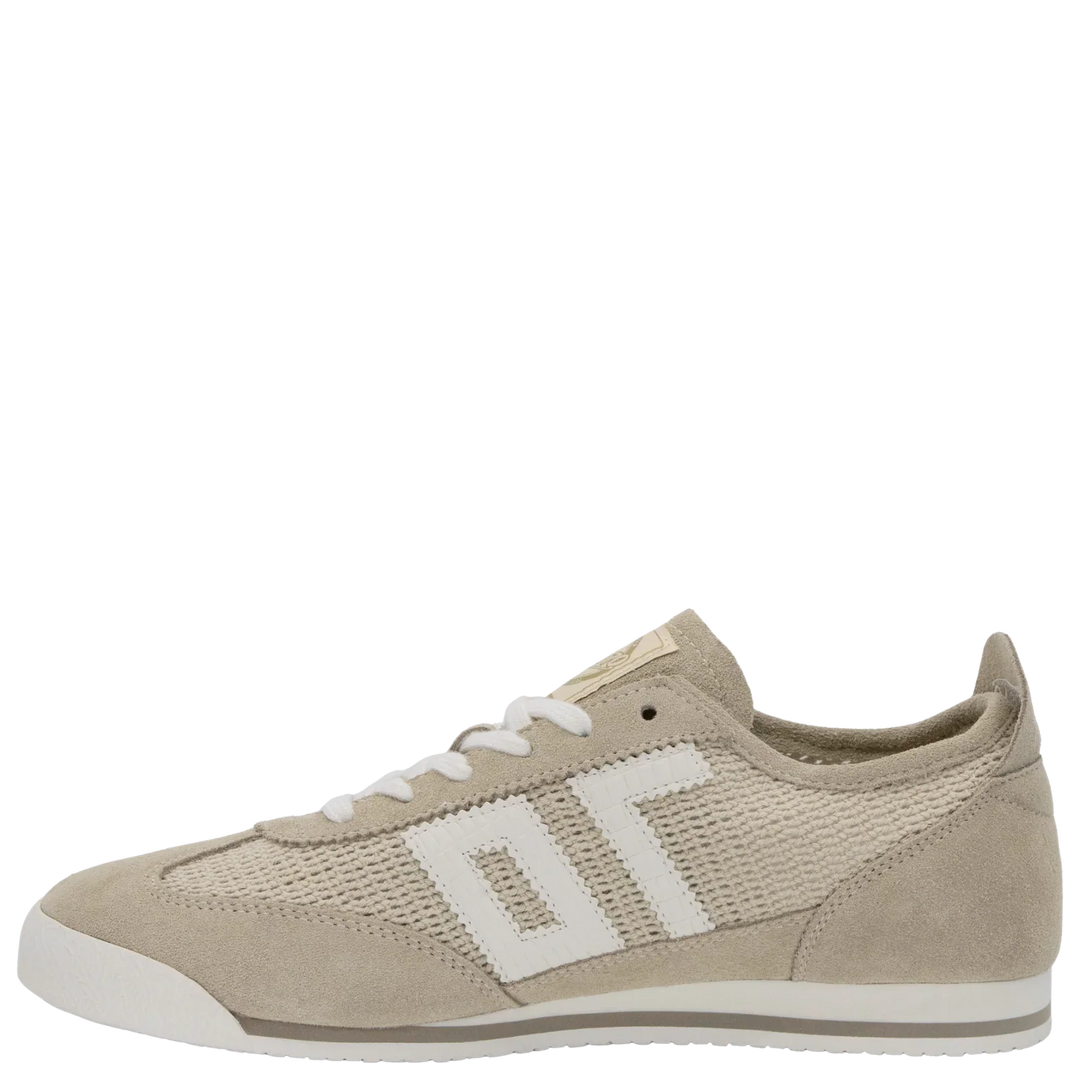 The Zertz LEON BEIGE SNEAKER features a beige and white mesh and handcrafted suede upper, white laces, rubber toe cap, and a stylized white DT logo on the side, displayed in profile against a plain background.