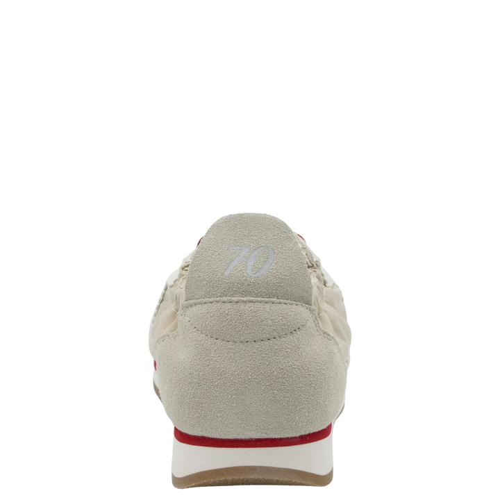 The Zertz ROCKET SAND SNEAKERS are beige with a suede finish, red sole accents, and "70" in light grey on the heel. Shown from the back on a plain white background.