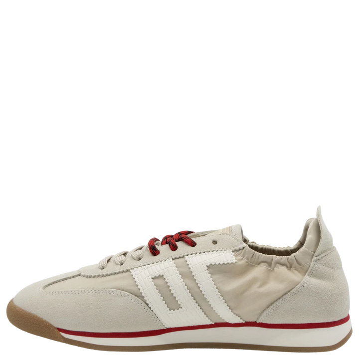 The Zertz ROCKET SAND SNEAKERS feature a beige, running-inspired design with red eyelets, white side stripes, tan suede toe and heel accents, and a gum sole highlighted by white and red stripes—shown in left profile for a casual look.