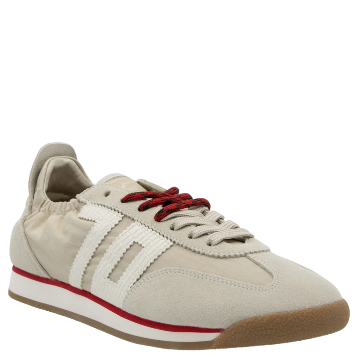 The Zertz ROCKET SAND SNEAKERS are beige, retro-inspired fashion sneakers with white stripes, red accents and laces, sporty details, a gum sole, white midsole, and a low-profile design with a padded heel collar for casual style.