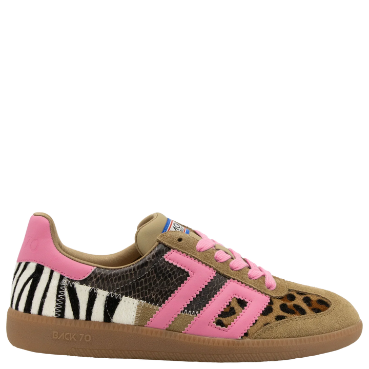 The Zertz SQUID IN LEOPARD ZEBRA FUXIA SNEAKER features zebra, leopard, and snakeskin patches, tan suede accents, pink laces, a pink 70 logo, and a light brown rubber sole for a unique vintage look.
