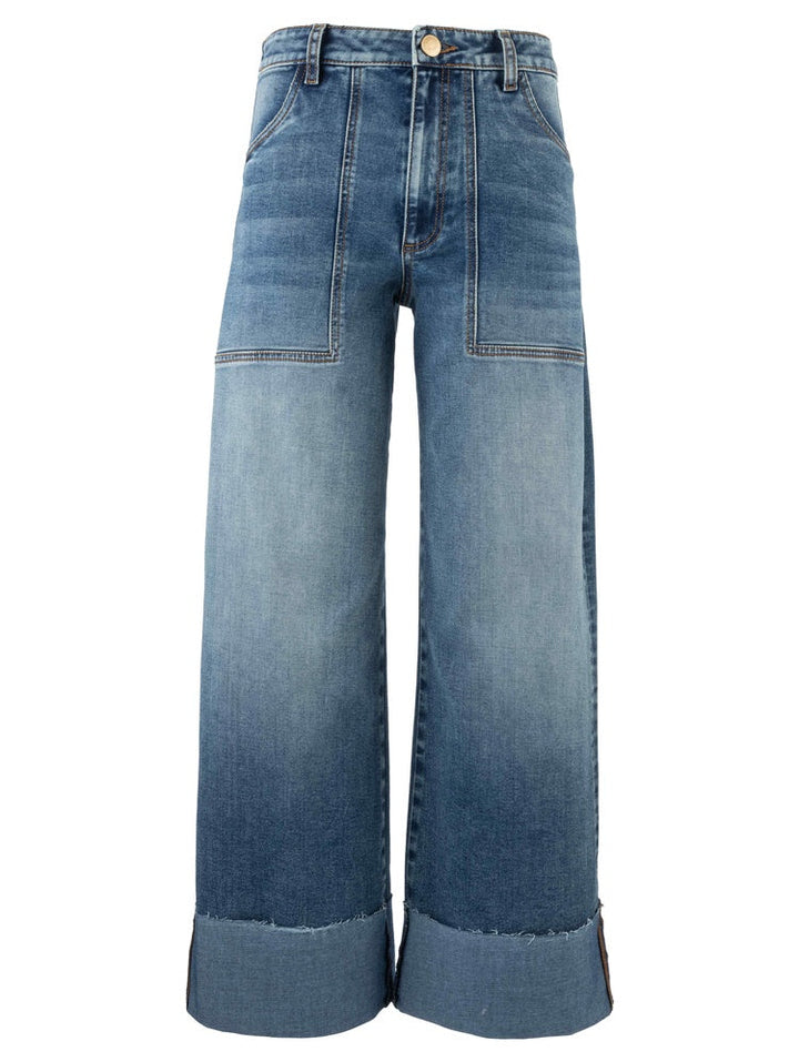 The Zertz MEG HIGH RISE WIDE LES ROLL UP jeans feature a relaxed wide-leg fit, prominent front patch pockets, contrast stitching, large folded cuffs, a slightly faded wash, and a button closure at the high-rise waistband.