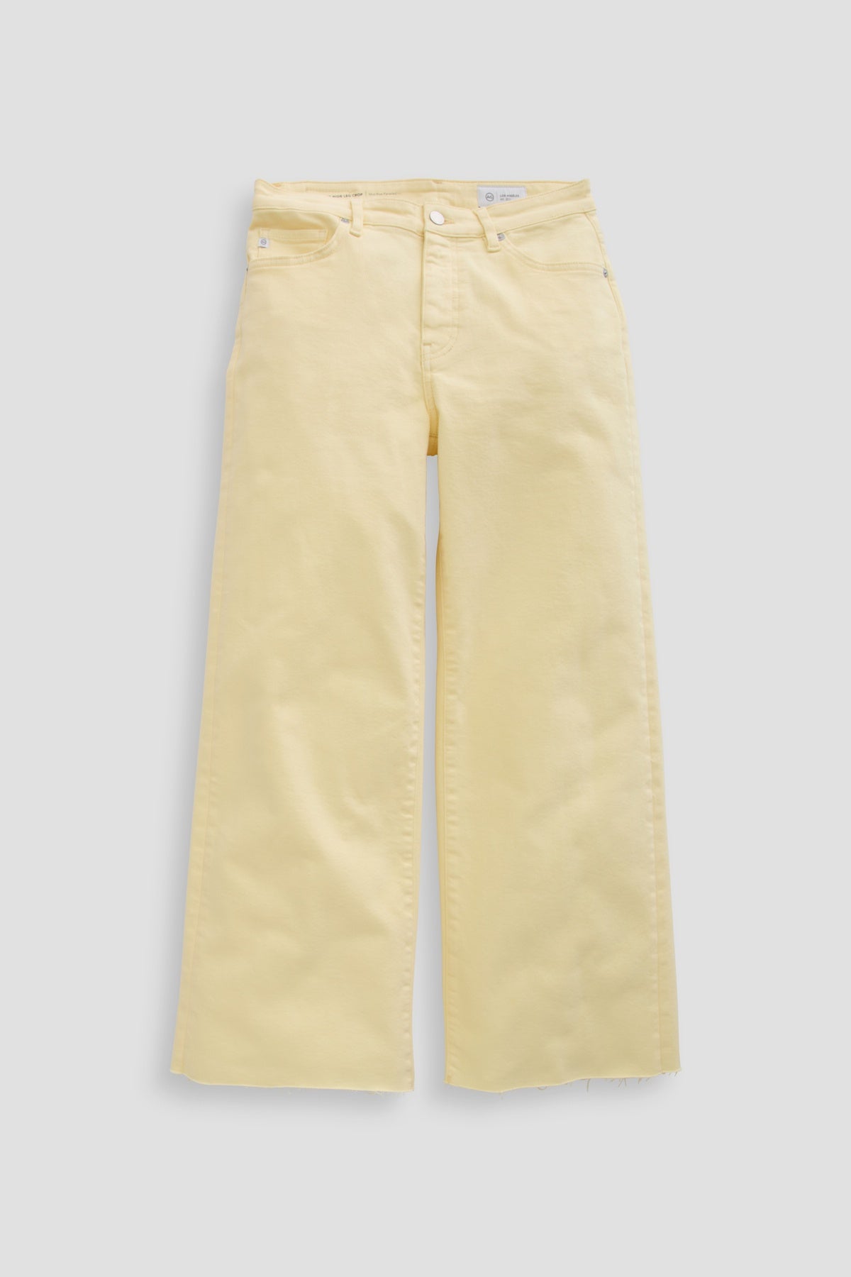 A pair of Zertz SAIGE WIDE LEG CROP yellow jeans is laid flat on a light gray background, featuring a high waist, wide-leg cropped silhouette, front and back pockets, belt loops, and a button-zip closure.