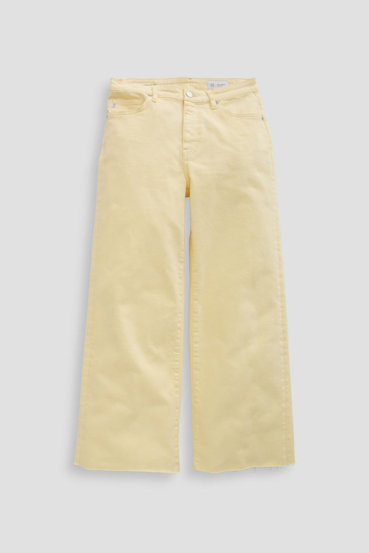 A pair of Zertz SAIGE WIDE LEG CROP yellow jeans is laid flat on a light gray background, featuring a high waist, wide-leg cropped silhouette, front and back pockets, belt loops, and a button-zip closure.